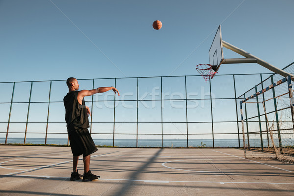 Basketball player scoring a point Stock photo © deandrobot