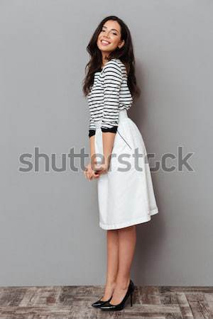 Full-length shot of asian woman showing thumb up Stock photo © deandrobot