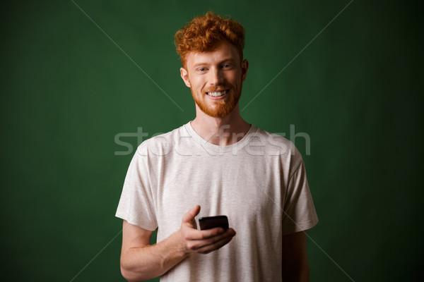 Portré fiatal mosolyog vörös hajú nő szakállas fiatalember Stock fotó © deandrobot