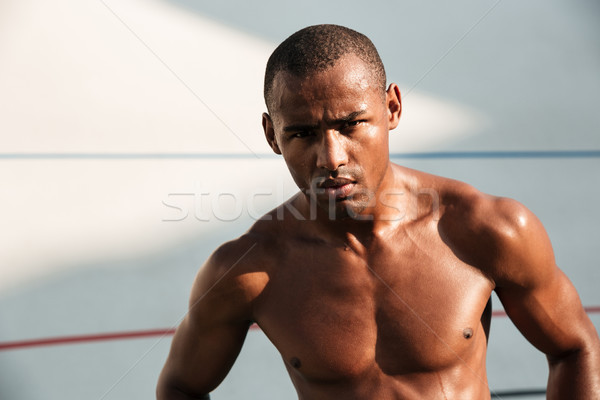 Close-up portrait of serious tired handsome afro american sports Stock photo © deandrobot