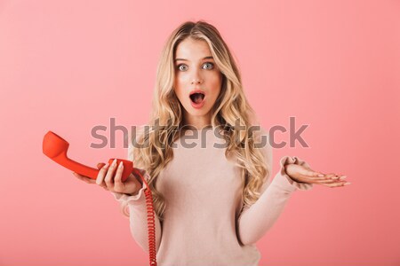 Emotional young woman in halloween costume Stock photo © deandrobot