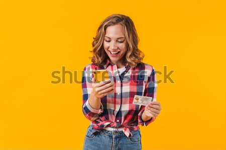 Smiling lady in 3d glasses drinking cola isolated over pink Stock photo © deandrobot