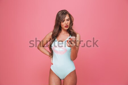 Porträt schockiert Mädchen Badeanzug posiert stehen Stock foto © deandrobot