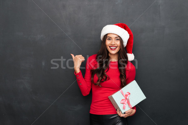 Sorridere bruna donna rosso camicetta Natale Foto d'archivio © deandrobot