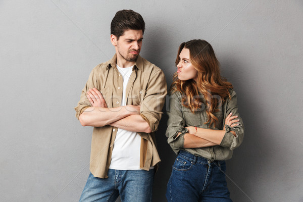 Stock photo: Portrait of an angry young couple having an argument