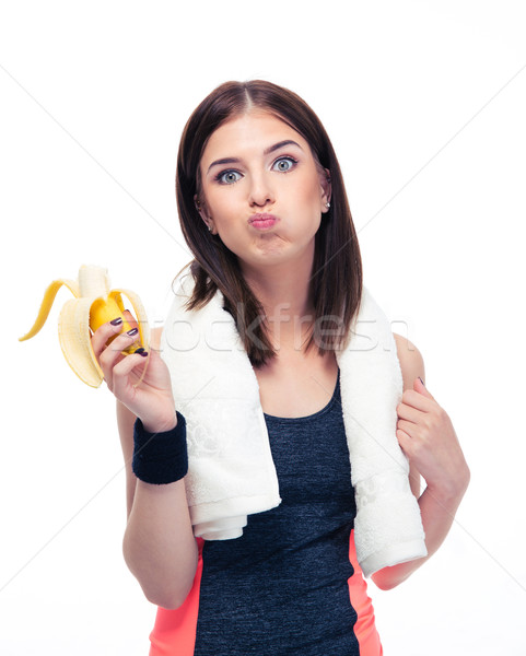 Deportes mujer comer plátano aislado blanco Foto stock © deandrobot