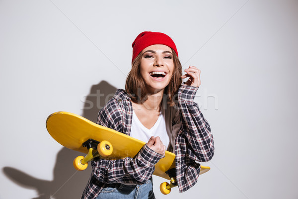 Stockfoto: Gelukkig · vrouw · geïsoleerd · witte · skateboard