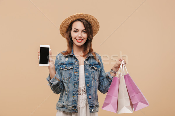 Portrait of a cheerful young girl in summer clothes Stock photo © deandrobot