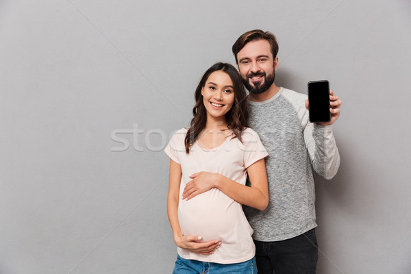 Portrait ravi jeunes enceintes couple [[stock_photo]] © deandrobot