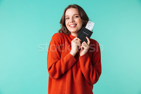 肖像 微笑 年輕女子 毛線衣 護照 商業照片 © deandrobot