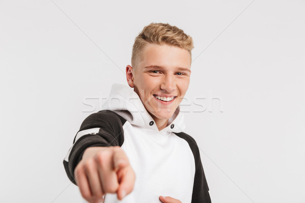 Portrait closeup of cheerful teenage boy 16-18 years old wearing Stock photo © deandrobot