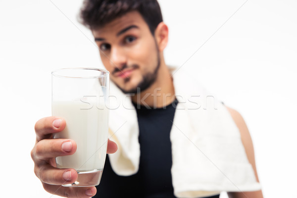 Stock photo: Man holding glass with milk