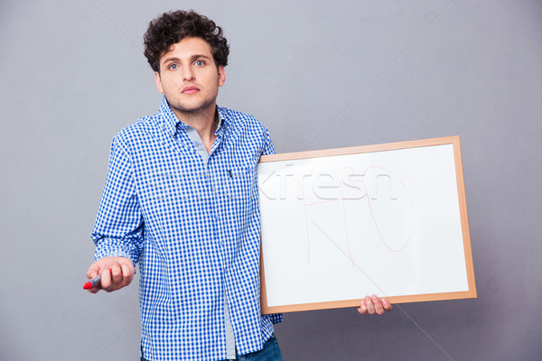 Student holding text board Stock photo © deandrobot
