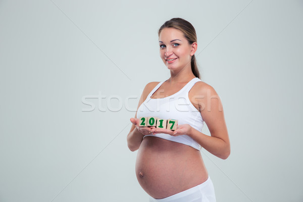 Foto stock: Mujer · embarazada · número · ladrillos · retrato · sonriendo