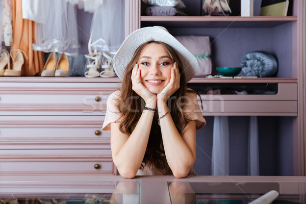 красивой шкафу молодые улыбающаяся женщина Сток-фото © deandrobot