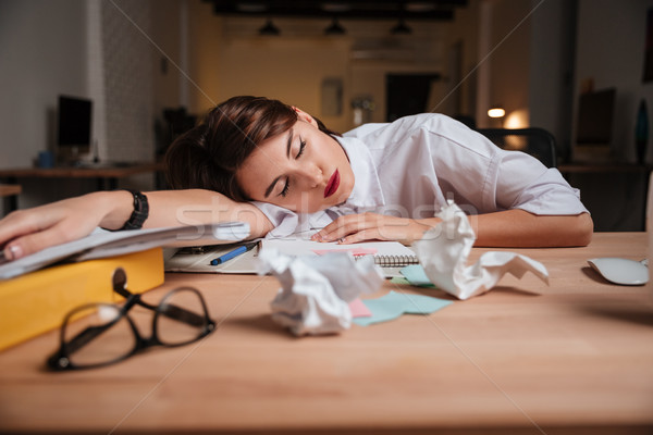 Weary business woman Stock photo © deandrobot