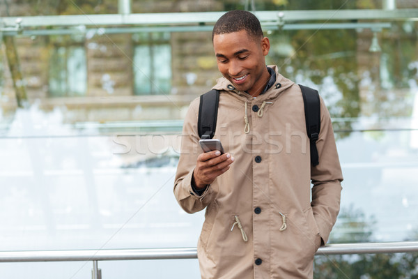 Feliz jóvenes África hombre aire libre Foto stock © deandrobot