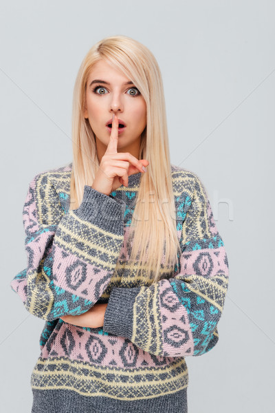 Kobieta sweter ciszy gest palec Zdjęcia stock © deandrobot