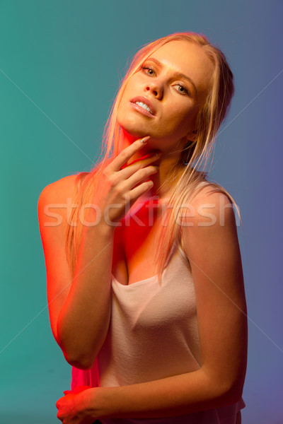 Unusual portrait of young pretty woman Stock photo © deandrobot