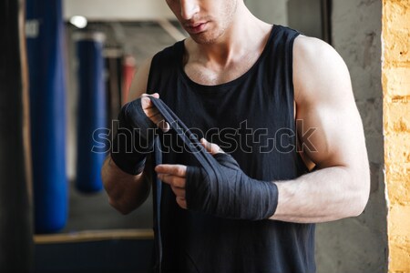 Imagen hombre guantes boxeo fuerte Foto stock © deandrobot