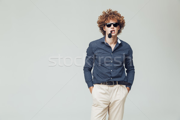 Handsome retro man dressed in shirt Stock photo © deandrobot