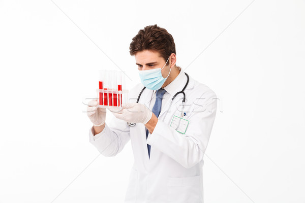 Foto stock: Retrato · jóvenes · doctor · de · sexo · masculino · estetoscopio · uniforme