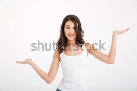 Portrait of a pretty girl dressed in tank-top Stock photo © deandrobot
