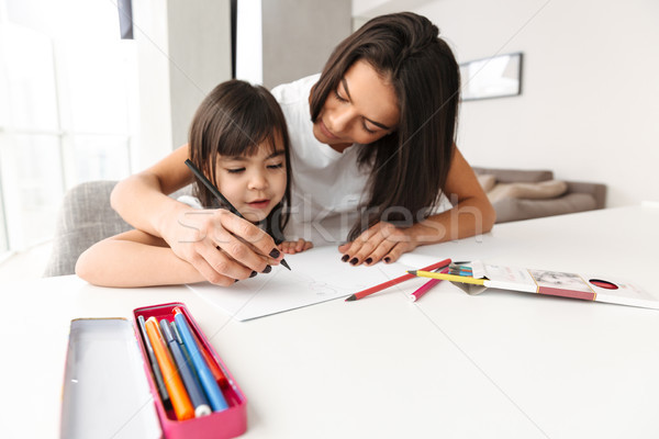 Stock photo: Image of beautiful people woman and child taking pleasure while 