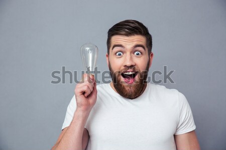 Young spanish football fan prays for win Stock photo © deandrobot