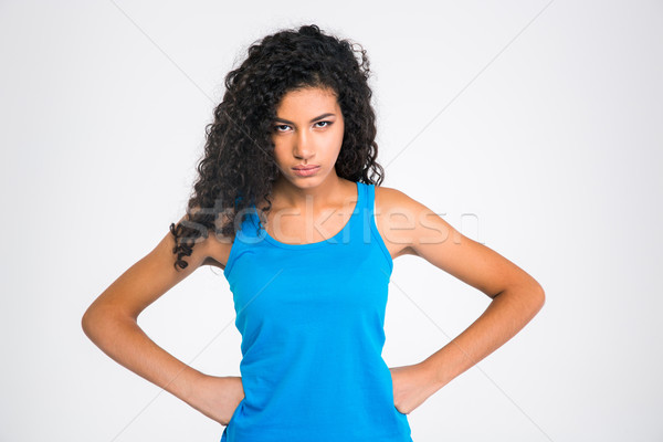 Serious afro american woman looking at camera Stock photo © deandrobot
