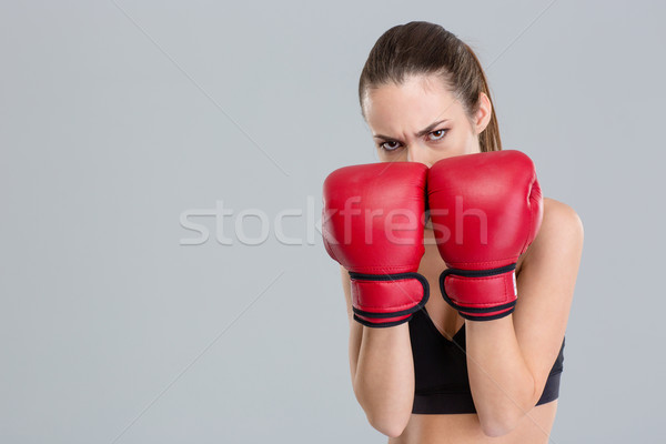 Erős intenzív fitnessz nő fedett arc boxkesztyűk Stock fotó © deandrobot