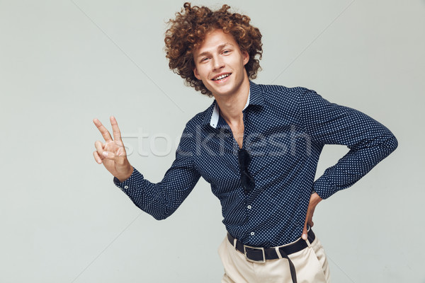 Happy young retro man dressed in shirt Stock photo © deandrobot