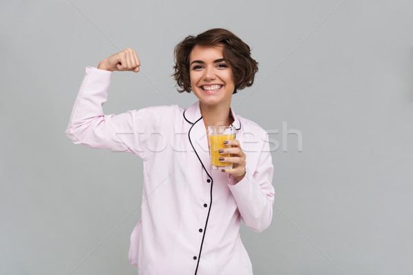 Portrait of a healthy smiling girl in pajamas Stock photo © deandrobot