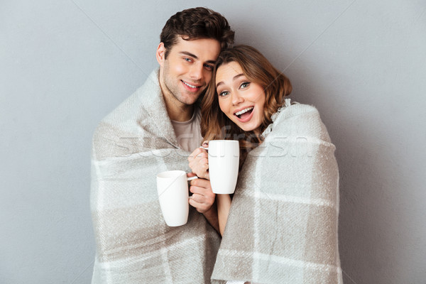 Stock photo: Portrait of a happy smiling couple