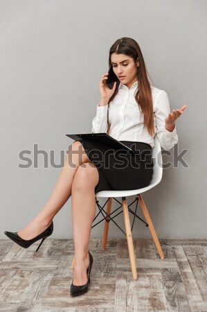Zdjęcia stock: Widok · z · boku · portret · sexy · kobieta · posiedzenia · krzesło · kobieta
