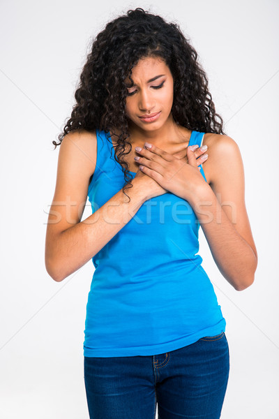 Afro american woman having pain in heart  Stock photo © deandrobot
