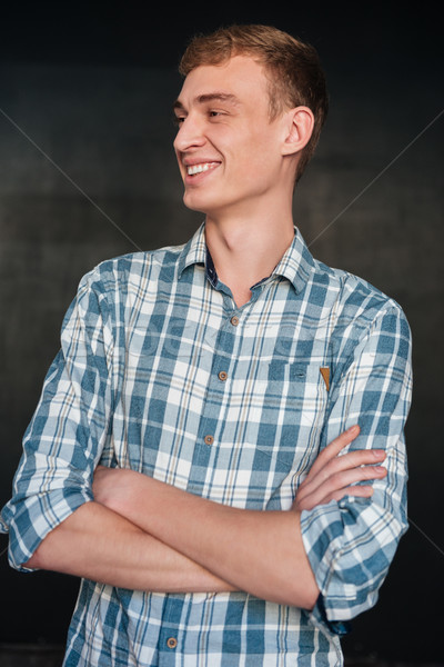 Smiling man in shirt Stock photo © deandrobot