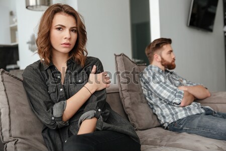 Smutne kłócić się kochający para posiedzenia sofa Zdjęcia stock © deandrobot
