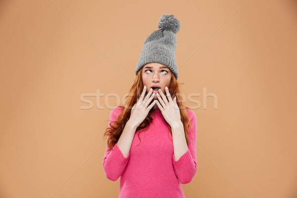 Portrait of a funny young redhead girl Stock photo © deandrobot