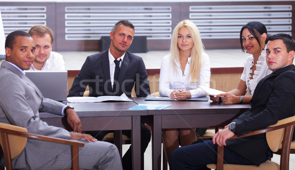 Gruppo uomini d'affari ufficio riunione finestra Foto d'archivio © deandrobot