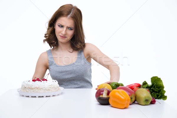 Nő választás torták egészséges zöldségek étel Stock fotó © deandrobot