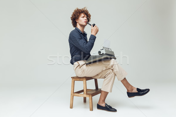 Serious thinking retro man dressed in shirt Stock photo © deandrobot