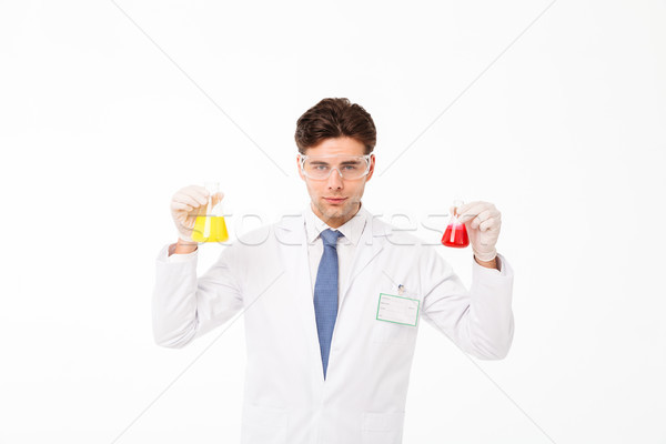 Portret zagęszczony młodych mężczyzna naukowiec uniform Zdjęcia stock © deandrobot