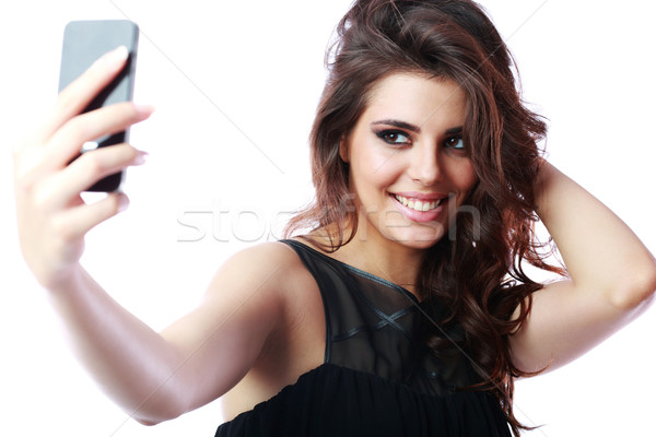 Gelukkig vrouw foto smartphone camera Stockfoto © deandrobot