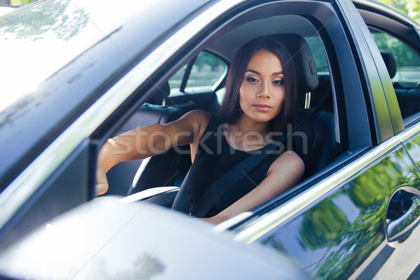 Woman driving car  Stock photo © deandrobot
