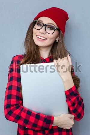 Woman showing blank tablet computer screen Stock photo © deandrobot