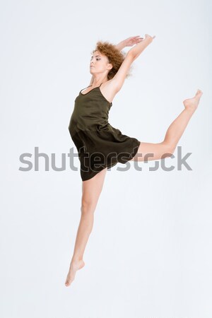 Woman dancing isolated on a white background Stock photo © deandrobot