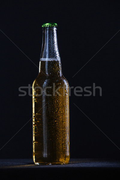 Bottle with beer Stock photo © deandrobot