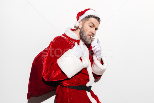 Stockfoto: Brutaal · man · kerstman · geschenk · zak