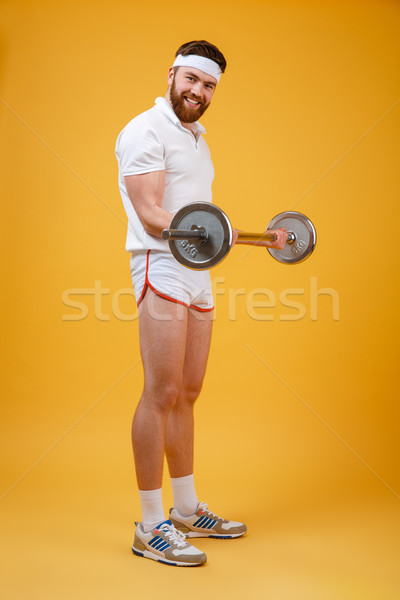 Foto stock: Sorridente · barbudo · homem · exercício · barbell